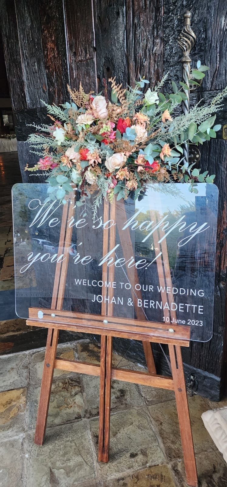 The sign shown above features a clean 3:4 portrait layout — perfect for entryways, garden paths, or reception spaces. It’s subtle, sophisticated, and designed to complement your wedding, not compete with it.